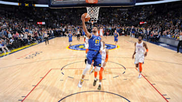 DENVER, CO - DECEMBER 14: Jamal Murray #27 of the Denver Nuggets drives to the basket during the game against the Oklahoma City Thunder on December 14, 2018 at the Pepsi Center in Denver, Colorado. NOTE TO USER: User expressly acknowledges and agrees that, by downloading and/or using this Photograph, user is consenting to the terms and conditions of the Getty Images License Agreement. Mandatory Copyright Notice: Copyright 2018 NBAE (Photo by Bart Young/NBAE via Getty Images)