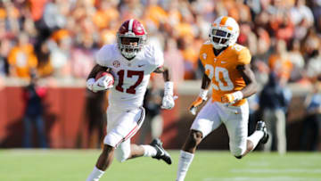 KNOXVILLE, TN - OCTOBER 20: Jaylen Waddle #17 of the Alabama Crimson Tide runs for yards being defended by Defensive back Bryce Thompson #20 of the Tennessee Volunteers during the game between the Alabama Crimson Tide and the Tennessee Volunteers at Neyland Stadium on October 20, 2018 in Knoxville, Tennessee. (Photo by Donald Page/Getty Images)