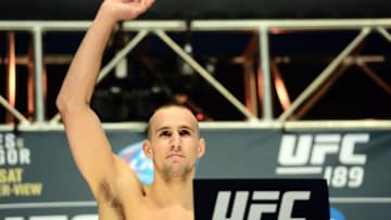 Jul 10, 2015; Las Vegas, NV, USA; Rory MacDonald steps on the scale for his bout against Robbie Lawler (not pictured) during weigh-ins for UFC 189 at MGM Grand Garden Arena. Mandatory Credit: Joe Camporeale-USA TODAY Sports