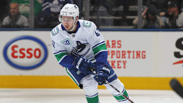 TORONTO, ON - FEBRUARY 29: Quinn Hughes #43 of the Vancouver Canucks skates with the puck against the Toronto Maple Leafs during an NHL game at Scotiabank Arena on February 29, 2020 in Toronto, Ontario, Canada. The Maple Leafs defeated the Canucks 4-2. (Photo by Claus Andersen/Getty Images)