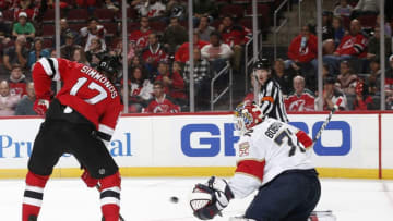 NEWARK, NJ - OCTOBER 14: Sergei Bobrovsky #72 of the Florida Panthers makes a save against Wayne Simmonds #17 of the New Jersey Devils during the third period on October 14, 2019 at the Prudential Center in Newark, New Jersey. The Panthers defeated the Devils 6-4. (Photo by Andy Marlin/NHLI via Getty Images)