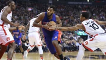 Jan 30, 2016; Toronto, Ontario, CAN; Detroit Pistons center Andre Drummond (0) goes to the basket as Toronto Raptors guard DeMar DeRozan (10) defends at Air Canada Centre. The Raptors beat the Pistons 111-107. Mandatory Credit: Tom Szczerbowski-USA TODAY Sports