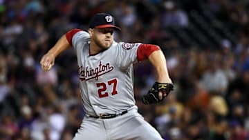 Aug 15, 2016; Denver, CO, USA; Washington Nationals relief pitcher Shawn Kelley (27) delivers a pitch in the eighth inning against the Colorado Rockies at Coors Field. The Nationals defeated the Rockies 5-4. Mandatory Credit: Ron Chenoy-USA TODAY Sports