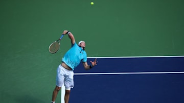 SHANGHAI, CHINA - OCTOBER 10: John Isner of the United States returns a shot during the Men's singles mach against Dusan Lajovic of Serbia on day three of 2017 ATP Shanghai Rolex Masters at Qizhong Stadium on October 10, 2017 in Shanghai, China. (Photo by Lintao Zhang/Getty Images)