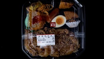 TOKYO, JAPAN - SEPTEMBER 11: A bento-box containing shredded pork over rice, egg, pasta, and pork cutlet from a convenience store or "konbini" is pictured on September 11, 2015 in Tokyo, Japan. Japan's Konbini stores (convenience stores) are famous for their high quality food, available 24hours a day. Many of the stores have 2-5 deliveries per day of fresh, often locally sourced products all prepared in ready to eat packaged meals, catering mostly to office workers and travellers. As of July 30, 2015, Japan's minimum wage was 780yen (approx. $6.45 USD) lower than in many countries, including the United States. With a small 2.3 percent rise in minimum wages expected this year, the cheap convenience store meals popularity has seen a steady rise in sales, fast food and daily food sales of convenience stores for 2014 was 3,807,614 million yen, according to the Ministry of Economy, Trade and Industry. (Photo by Chris McGrath/Getty Images)