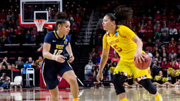 COLLEGE PARK, MD - MARCH 19: Maryland Terrapins guard Destiny Slocum (5) dribbles up to West Virginia Mountaineers guard Chania Ray (12) during a Div. 1 NCAA Women's basketball 2nd. round game between Maryland and West Virginia on March 19, 2017, at Xfinity Center in College Park, Maryland. Maryland defeated West Virginia 83-56. (Photo by Tony Quinn/Icon Sportswire via Getty Images)