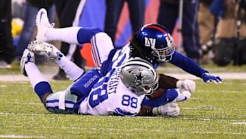 Dec 11, 2016; East Rutherford, NJ, USA; New York Giants cornerback Janoris Jenkins (20) intercepts a pass in the 1st half in front of Dallas Cowboys wide receiver Dez Bryant (88) at MetLife Stadium. Mandatory Credit: Robert Deutsch-USA TODAY Sports