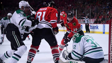 Nov 6, 2016; Chicago, IL, USA; Dallas Stars goalie Kari Lehtonen (32) makes a save against Chicago Blackhawks center Artem Anisimov (15) and right wing Marian Hossa (81) during the first period at United Center. Mandatory Credit: Mike DiNovo-USA TODAY Sports