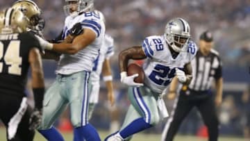 Sep 28, 2014; Arlington, TX, USA; Dallas Cowboys running back DeMarco Murray (29) runs with the ball against the New Orleans Saints at AT&T Stadium. Mandatory Credit: Matthew Emmons-USA TODAY Sports