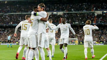 MADRID, SPAIN - FEBRUARY 26: (L-R) Vinicius Junior of Real Madrid, Sergio Ramos of Real Madrid during the UEFA Champions League match between Real Madrid v Manchester City at the Santiago Bernabeu on February 26, 2020 in Madrid Spain (Photo by David S. Bustamante/Soccrates/Getty Images)