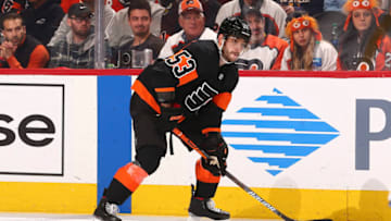 PHILADELPHIA, PA - DECEMBER 23: Shayne Gostisbehere #53 of the Philadelphia Flyers controls the puck against the New York Rangers at the Wells Fargo Center on December 23, 2019 in Philadelphia, Pennsylvania. (Photo by Mitchell Leff/Getty Images)