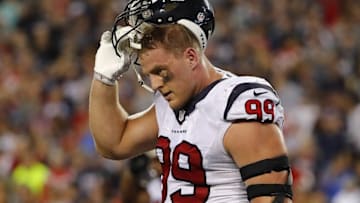 Sep 22, 2016; Foxborough, MA, USA; Houston Texans defensive end J.J. Watt (99) heads for the bench after a New England Patriots touchdown during the second half at Gillette Stadium. Mandatory Credit: Winslow Townson-USA TODAY Sports