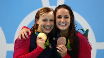 Aug 7, 2016; Rio de Janeiro, Brazil; Katie Ledecky (USA) and Leah Smith (USA) celebrate with their medals after the women