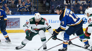 ST. LOUIS, MO - NOVEMBER 25: Jaden Schwartz #17 of the St. Louis Blues takes a shot as Matt Dumba #24 of the Minnesota Wild defends at Scottrade Center on November 25, 2017 in St. Louis, Missouri. (Photo by Scott Rovak/NHLI via Getty Images)