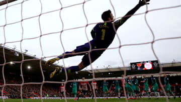 SOUTHAMPTON, ENGLAND - MARCH 09: Hugo Lloris of Tottenham Hotspur dives for the ball as James Ward-Prowse of Southampton scores his team's second goal during the Premier League match between Southampton FC and Tottenham Hotspur at St Mary's Stadium on March 09, 2019 in Southampton, United Kingdom. (Photo by Catherine Ivill/Getty Images)