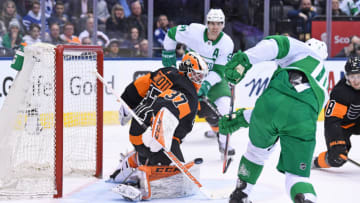 TORONTO, ON - MARCH 15: Toronto Maple Leafs Left Wing Zach Hyman (11) scores a goal on Philadelphia Flyers Goalie Brian Elliott (37) in the second period during the regular season NHL game between the Philadelphia Flyers and Toronto Maple Leafs on March 15, 2019 at Scotiabank Arena in Toronto, ON. (Photo by Gerry Angus/Icon Sportswire via Getty Images)