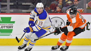 Apr 17, 2022; Philadelphia, Pennsylvania, USA; Buffalo Sabres center Peyton Krebs (19) controls the puck against Philadelphia Flyers left wing Joel Farabee (86) during the third period at Wells Fargo Center. Mandatory Credit: Eric Hartline-USA TODAY Sports