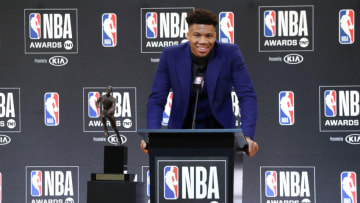 SANTA MONICA, CA - JUNE 24: Giannis Antetokounmpo #34 of the Milwaukee Bucks peaks with the media during a press conference after the 2019 NBA Awards Show at the Barker Hangar on June 24, 2019 in Santa Monica, California. NOTE TO USER: User expressly acknowledges and agrees that, by downloading and/or using this Photograph, user is consenting to the terms and conditions of the Getty Images License Agreement. Mandatory Copyright Notice: Copyright 2019 NBAE (Photo by Will Navarro/NBAE via Getty Images)