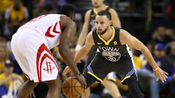 OAKLAND, CA - MAY 22: Stephen Curry #30 of the Golden State Warriors defends James Harden #13 of the Houston Rockets during Game Four of the Western Conference Finals of the 2018 NBA Playoffs at ORACLE Arena on May 22, 2018 in Oakland, California. NOTE TO USER: User expressly acknowledges and agrees that, by downloading and or using this photograph, User is consenting to the terms and conditions of the Getty Images License Agreement. (Photo by Ezra Shaw/Getty Images)