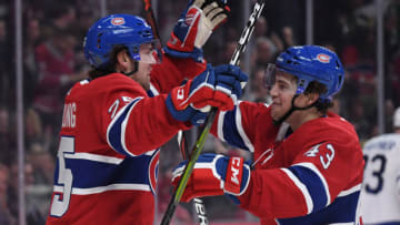 MONTREAL, QC - APRIL 6: Ryan Poehling #25 and Jordan Weal #43 of the Montreal Canadiens celebrate after scoring a goal against the Toronto Maple Leafs in the NHL game at the Bell Centre on April 6, 2019 in Montreal, Quebec, Canada. (Photo by Francois Lacasse/NHLI via Getty Images)