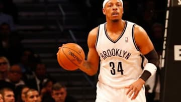 Dec 12, 2013; Brooklyn, NY, USA; Brooklyn Nets small forward Paul Pierce (34) advances the ball during the fourth quarter against the Los Angeles Clippers at Barclays Center. Brooklyn Nets won 102-93. Mandatory Credit: Anthony Gruppuso-USA TODAY Sports