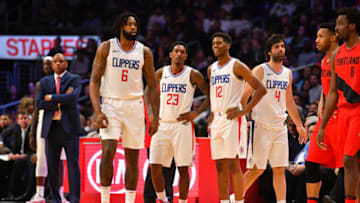 LOS ANGELES, CA - JANUARY 30: Los Angeles Clippers Center DeAndre Jordan (6), Los Angeles Clippers Guard Lou Williams (23), Los Angeles Clippers Guard Tyrone Wallace (12) and Los Angeles Clippers Guard Milos Teodosic (4) look on during an NBA game between the Portland Trail Blazers and the Los Angeles Clippers on January 30, 2018 at STAPLES Center in Los Angeles, CA. (Photo by Brian Rothmuller/Icon Sportswire via Getty Images)