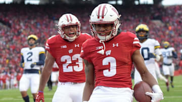 MADISON, WI - NOVEMBER 18: Jonathan Taylor #23 of the Wisconsin Badgers reacts to a touchdown by Kendric Pryor #3 during the third quarter of a game against the Michigan Wolverines at Camp Randall Stadium on November 18, 2017 in Madison, Wisconsin. (Photo by Stacy Revere/Getty Images)