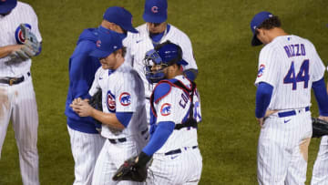 CHICAGO, ILLINOIS - AUGUST 04: Manager David Ross #3 of the Chicago Cubs walks to the mound to remove Craig Kimbrel #46 during the ninth inning of a game against the Kansas City Royals at Wrigley Field on August 04, 2020 in Chicago, Illinois. (Photo by Nuccio DiNuzzo/Getty Images)