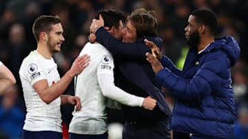 Tottenham Hotspur's Italian head coach Antonio Conte (centre right) congratulates Tottenham Hotspur's South Korean striker Son Heung-Min on the pitch after the English Premier League football match between Tottenham Hotspur and Leeds United at Tottenham Hotspur Stadium in London, on November 21, 2021. - Tottenham won the game 2-1. - RESTRICTED TO EDITORIAL USE. No use with unauthorized audio, video, data, fixture lists, club/league logos or 'live' services. Online in-match use limited to 120 images. An additional 40 images may be used in extra time. No video emulation. Social media in-match use limited to 120 images. An additional 40 images may be used in extra time. No use in betting publications, games or single club/league/player publications. (Photo by Adrian DENNIS / AFP) / RESTRICTED TO EDITORIAL USE. No use with unauthorized audio, video, data, fixture lists, club/league logos or 'live' services. Online in-match use limited to 120 images. An additional 40 images may be used in extra time. No video emulation. Social media in-match use limited to 120 images. An additional 40 images may be used in extra time. No use in betting publications, games or single club/league/player publications. / RESTRICTED TO EDITORIAL USE. No use with unauthorized audio, video, data, fixture lists, club/league logos or 'live' services. Online in-match use limited to 120 images. An additional 40 images may be used in extra time. No video emulation. Social media in-match use limited to 120 images. An additional 40 images may be used in extra time. No use in betting publications, games or single club/league/player publications. (Photo by ADRIAN DENNIS/AFP via Getty Images)