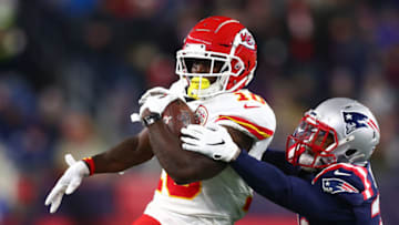FOXBOROUGH, MASSACHUSETTS - DECEMBER 08: Jonathan Jones #31 of the New England Patriots attempts to tackle Tyreek Hill #10 of the Kansas City Chiefs in the game at Gillette Stadium on December 08, 2019 in Foxborough, Massachusetts. (Photo by Adam Glanzman/Getty Images)