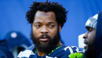 SEATTLE, WA - DECEMBER 31: Defensive end Michael Bennett #72 of the Seattle Seahawks sits on the bench while the offense plays against the Arizona Cardinals at CenturyLink Field on December 31, 2017 in Seattle, Washington. (Photo by Otto Greule Jr /Getty Images)