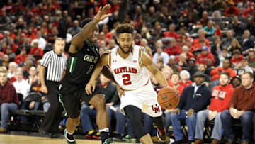 Dec 20, 2016; Baltimore, MD, USA; Maryland Terrapins guard Melo Trimble (2) defended by Charlotte 49ers guard Braxton Ogbueze (1) at Royal Farms Arena. Mandatory Credit: Mitch Stringer-USA TODAY Sports