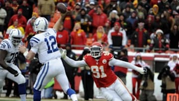 Dec 22, 2013; Kansas City, MO, USA; Kansas City Chiefs outside linebacker Tamba Hali (91) pressures Indianapolis Colts quarterback Andrew Luck (12) in the first half at Arrowhead Stadium. Mandatory Credit: John Rieger-USA TODAY Sports