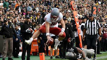 BOULDER, CO - NOVEMBER 10: Washington State Cougars quarterback Gardner Minshew (16) reaches across the goal line and scores a touchdown over Colorado Buffaloes linebacker Rick Gamboa (32) in the third quarter at Folsom Field November 10, 2018. Washington State won 31-7. (Photo by Andy Cross/The Denver Post via Getty Images)