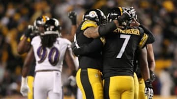 Nov 2, 2014; Pittsburgh, PA, USA; Pittsburgh Steelers quarterback Ben Roethlisberger (7) is congratulated after throwing a touchdown pass against the Baltimore Ravens during the first half of the game at Heinz Field. Mandatory Credit: Jason Bridge-USA TODAY Sports