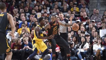 CLEVELAND, OH - APRIL 18: LeBron James #23 of the Cleveland Cavaliers handles the ball against Victor Oladipo #4 of the Indiana Pacers in Game Two of Round One during the 2018 NBA Playoffs on April 18, 2018 at Quicken Loans Arena in Cleveland, Ohio. NOTE TO USER: User expressly acknowledges and agrees that, by downloading and/or using this photograph, user is consenting to the terms and conditions of the Getty Images License Agreement. Mandatory Copyright Notice: Copyright 2018 NBAE (Photo by David Liam Kyle/NBAE via Getty Images)