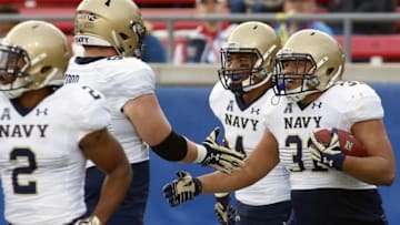 Nov 26, 2016; Dallas, TX, USA; Navy Midshipmen fullback Shawn White (31) celebrates his 50-yard touchdown run against the SMU Mustangs during the third quarter at Gerald J. Ford Stadium. Mandatory Credit: Ray Carlin-USA TODAY Sports