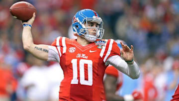 Jan 1, 2016; New Orleans, LA, USA; Mississippi Rebels quarterback Chad Kelly (10) looks to throw a pass against the Oklahoma State Cowboys in the second quarter of the 2016 Sugar Bowl at the Mercedes-Benz Superdome. Mandatory Credit: Chuck Cook-USA TODAY Sports