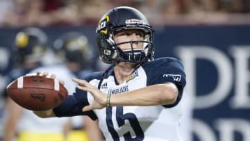 Sep 19, 2015; Tucson, AZ, USA; Northern Arizona Lumberjacks quarterback Case Cookus (15) warms up before the game against the Arizona Wildcats at Arizona Stadium. Mandatory Credit: Casey Sapio-USA TODAY Sports