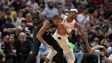 Brooklyn Nets forward Kevin Durant (7) dribbles the ball in front of Miami Heat forward Jimmy Butler (22)(Michael Laughlin-USA TODAY Sports)