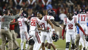 Nov 12, 2016; College Station, TX, USA; Mississippi Rebels tight end Evan Engram (17) celebrates with teammates after the Rebels defeated the Texas A&M Aggies 29-28 at Kyle Field. Mandatory Credit: Troy Taormina-USA TODAY Sports