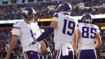 LANDOVER, MD - NOVEMBER 13: Wide receiver Adam Thielen #19 of the Minnesota Vikings celebrates with teammate quarterback Sam Bradford #8 after scoring a second quarter touchdown against the Washington Redskins at FedExField on November 13, 2016 in Landover, Maryland. (Photo by Rob Carr/Getty Images)