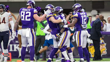 Jan 1, 2017; Minneapolis, MN, USA; Minnesota Vikings running back Jerick McKinnon (21) celebrates his touchdown with wide receiver Adam Thielen (19) during the first quarter against the Chicago Bears at U.S. Bank Stadium. Mandatory Credit: Brace Hemmelgarn-USA TODAY Sports