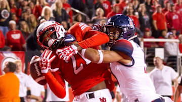 Oct 8, 2016; Salt Lake City, UT, USA; Arizona Wildcats cornerback Dane Cruikshank (9) defends against a pass intended for Utah Utes wide receiver Tyrone Smith (21) during the first half at Rice-Eccles Stadium. Mandatory Credit: Russ Isabella-USA TODAY Sports