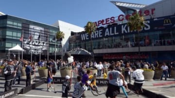 Jun 4, 2014; Los Angeles, CA, USA; Fans play street hockey outside before game one of the 2014 Stanley Cup Final between the New York Rangers and the Los Angeles Kings at Staples Center. Mandatory Credit: Kirby Lee-USA TODAY Sports