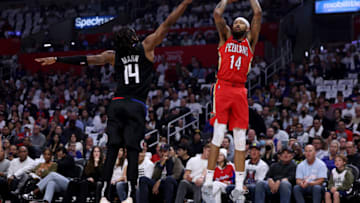 LOS ANGELES, CALIFORNIA - APRIL 15: Brandon Ingram #14 of the New Orleans Pelicans scores Notice: Copyright 2022 NBAE