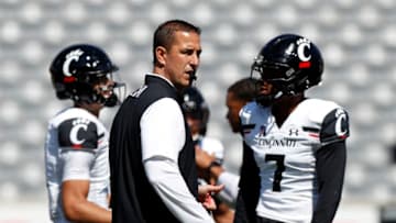 HOUSTON, TX - OCTOBER 12: Head coach Luke Fickell of the Cincinnati Bearcats watches players warm up before the game against the Houston Cougars at TDECU Stadium on October 12, 2019 in Houston, Texas. (Photo by Tim Warner/Getty Images)