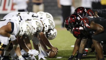 LOUISVILLE, KY - OCTOBER 05: Georgia Tech Yellow Jackets face off at the line of scrimmage against the Louisville Cardinals during the game at Cardinal Stadium on October 5, 2018 in Louisville, Kentucky. Georgia Tech won 66-31. (Photo by Joe Robbins/Getty Images)