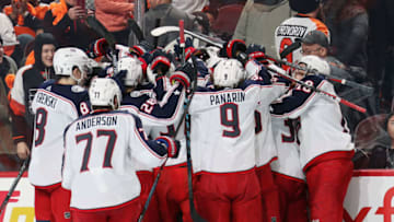 PHILADELPHIA, PA - DECEMBER 06: Members of the Columbus Blue Jackets celebrate after defeating the Philadelphia Flyers 4-3 in overtime on December 6, 2018 at the Wells Fargo Center in Philadelphia, Pennsylvania. (Photo by Len Redkoles/NHLI via Getty Images)