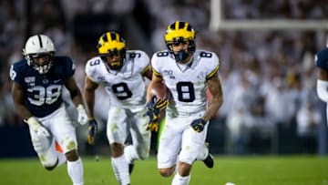 UNIVERSITY PARK, PA - OCTOBER 19: Ronnie Bell #8 of the Michigan Wolverines runs with the ball for a first down during the fourth quarter against the Penn State Nittany Lions on October 19, 2019 at Beaver Stadium in University Park, Pennsylvania. Penn State defeats Michigan 28-21. (Photo by Brett Carlsen/Getty Images)